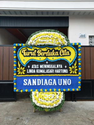 Papan Bunga Duka di Muara Wis